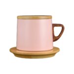 stainless steel cup with wooden mat
